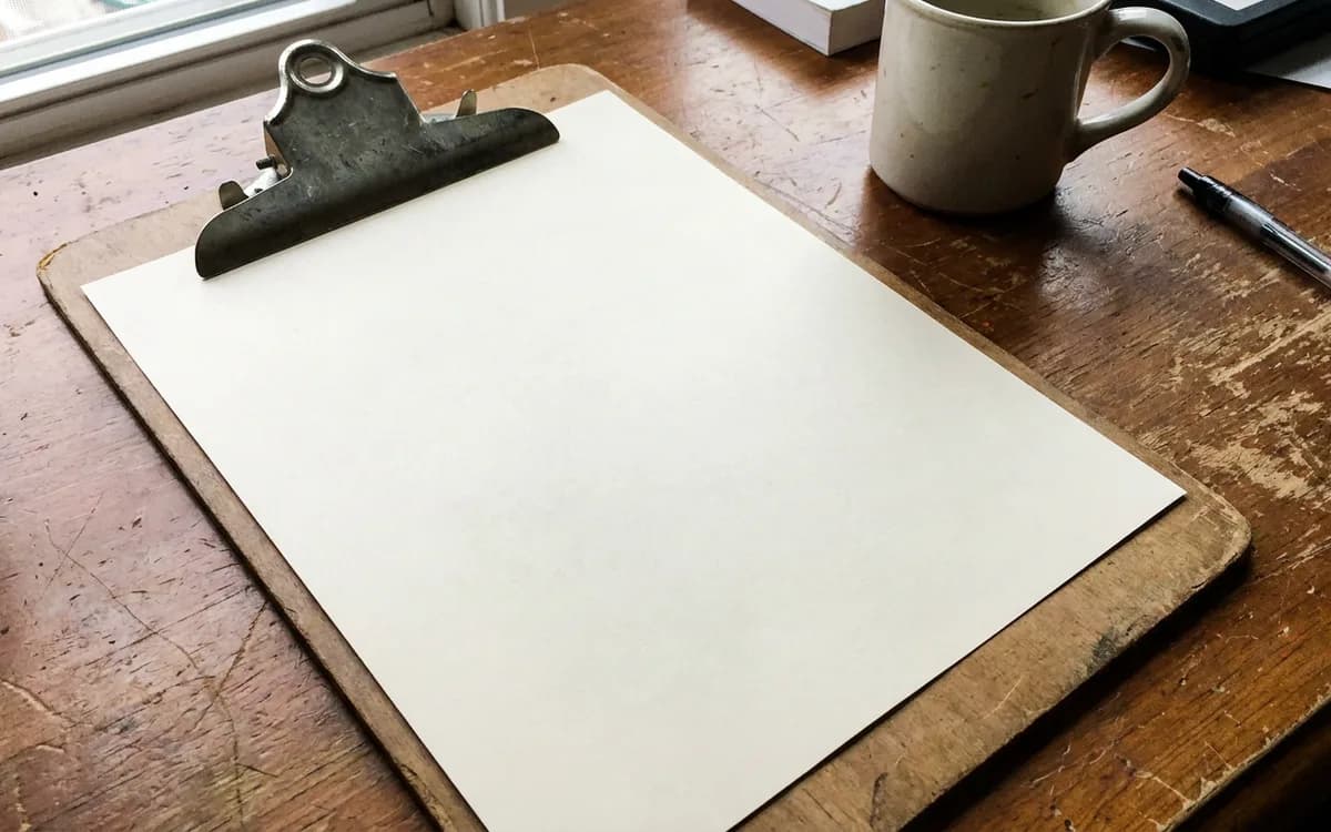 Blank permit application form on a clipboard