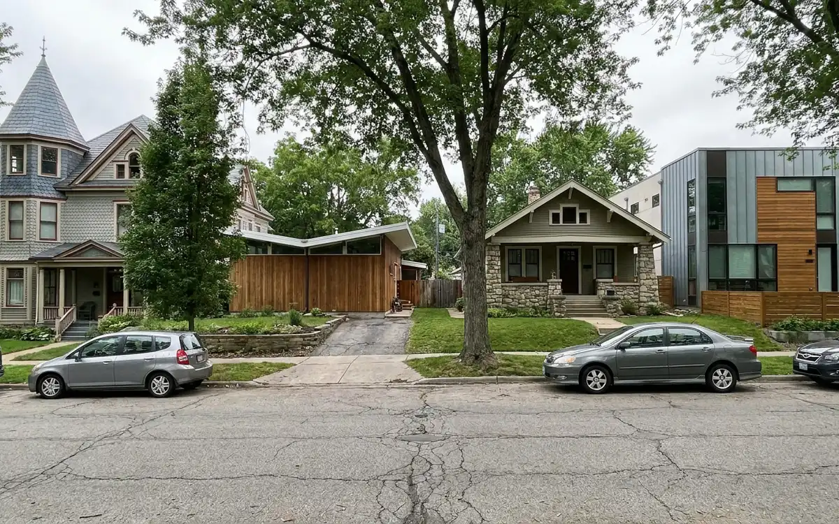 Street showing homes from several different building eras side by side